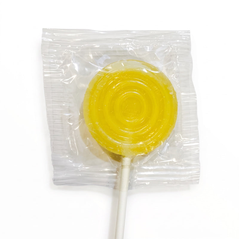 Bienenprodukte Shop Honiglolli in transparenter Verpackung, runder gelber Lutscher mit natürlichem Honigaroma